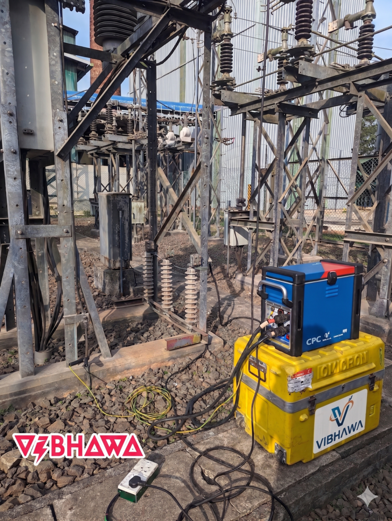 Vibhawa engineer using an OMICRON CPC 100 for primary injection testing at an electrical substation