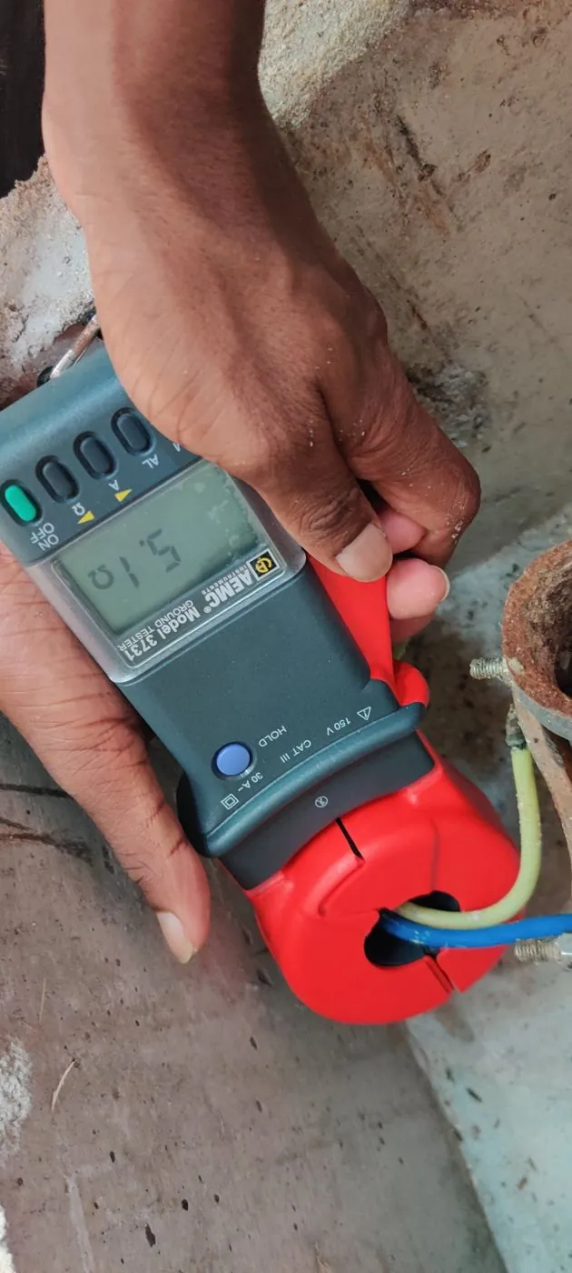 Clamp-on earth resistance test on an earth conductor at an earth pit