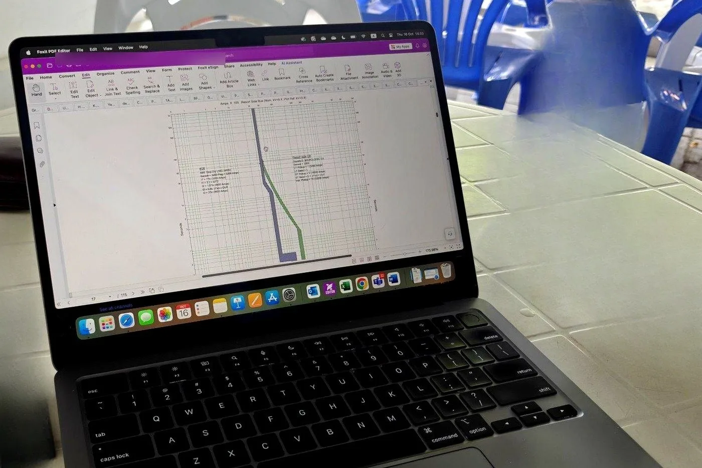 Vibhawa engineer reviewing busbar protection grading on a laptop at a Maldives resort