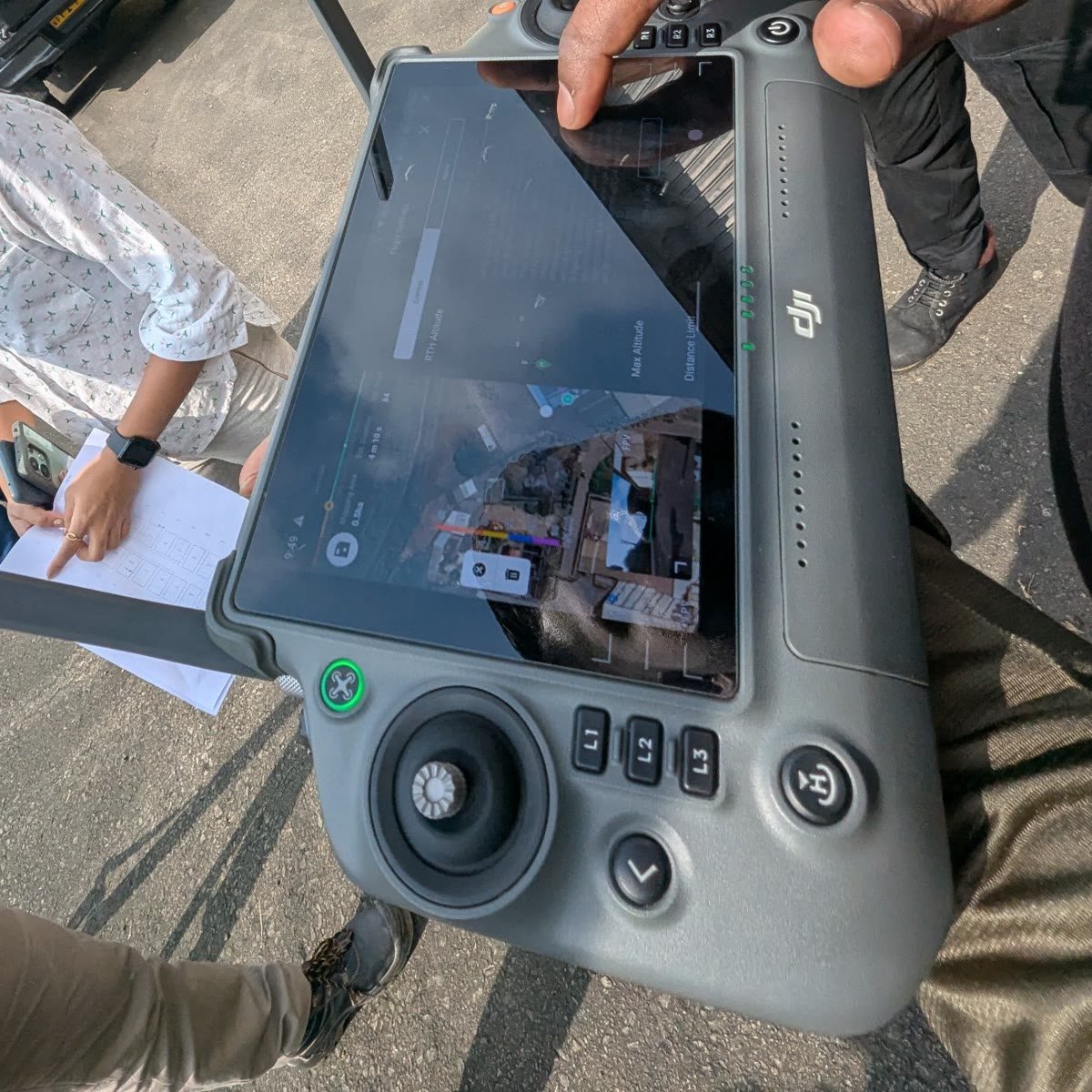 CAASL-registered pilot and Vibhawa thermographer reviewing the flight plan during a solar PV drone thermography survey